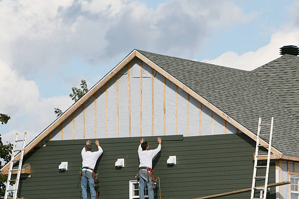Professional Siding technician working in Entriken, PA
